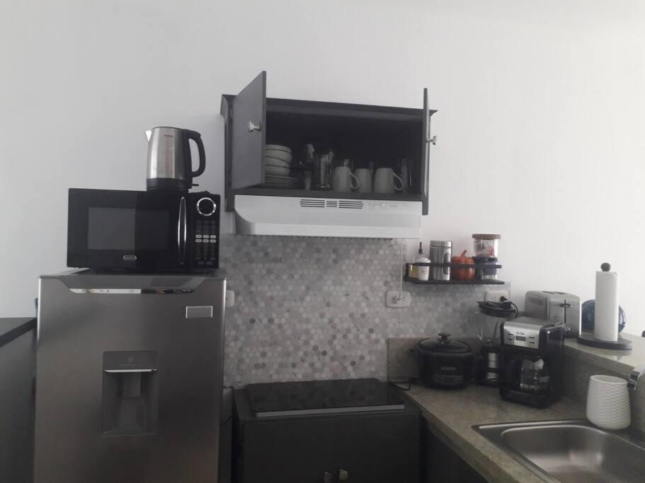 cr.arenalapartments#1..hermoso,cómodo con parqueo