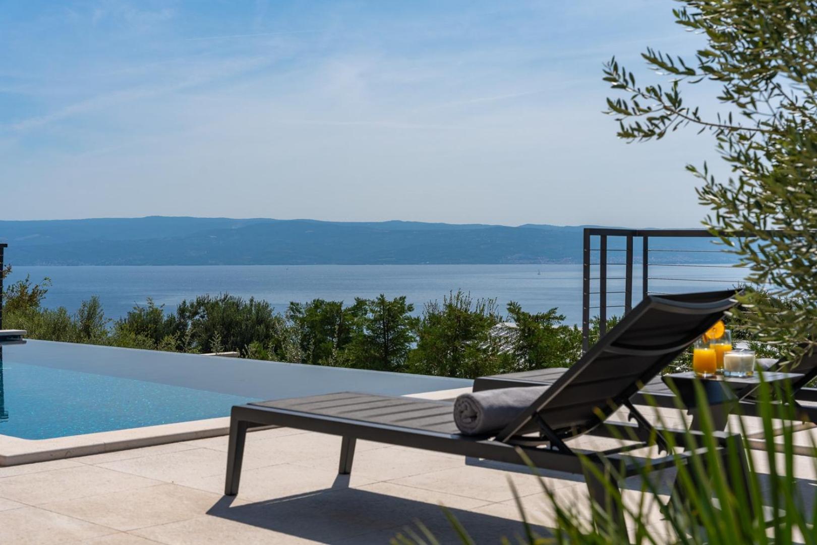 Stylish Villa Olea with heated pool and panoramic sea views view 5