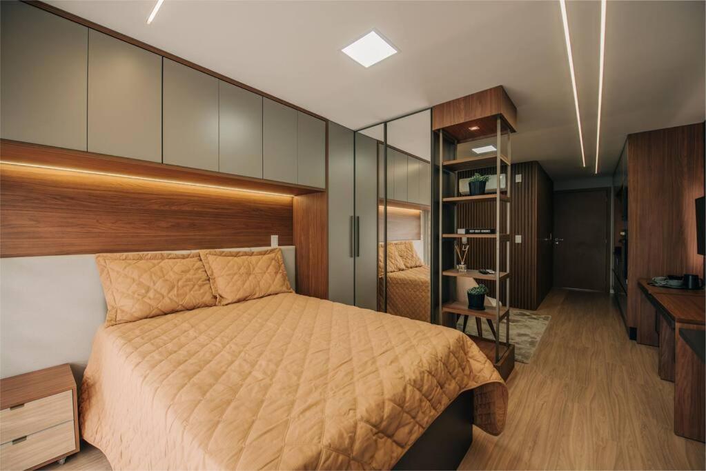 Loft com sacada, lareira e garagem no Parque Una