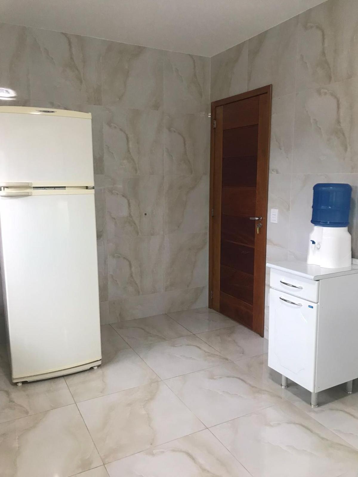 Casa de vidro com vista para a Mata Atlântica no Centro de Miguel Pereira