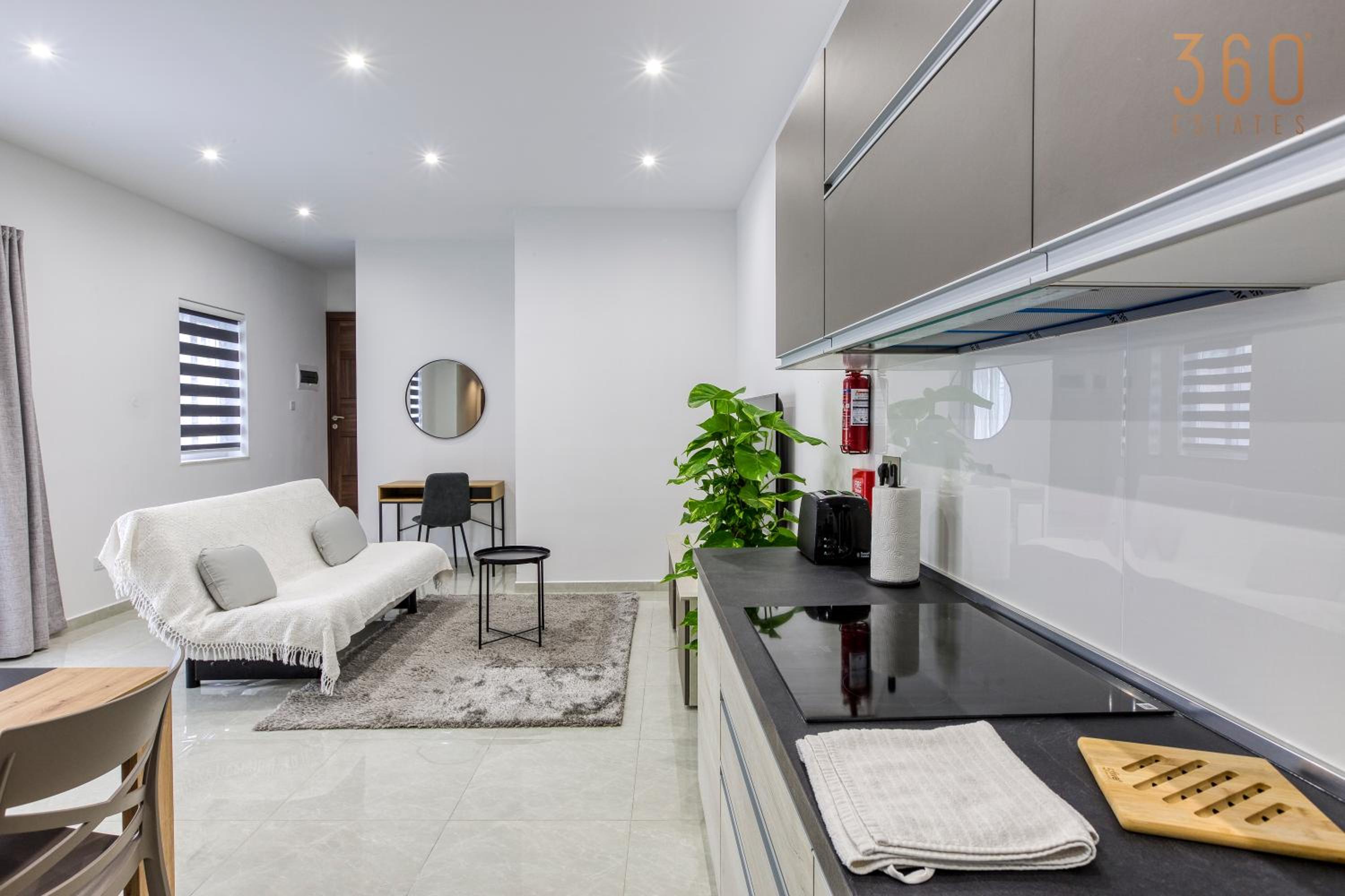 A lovely 1BR home with Balcony just off the coast by 360 Estates photo 4