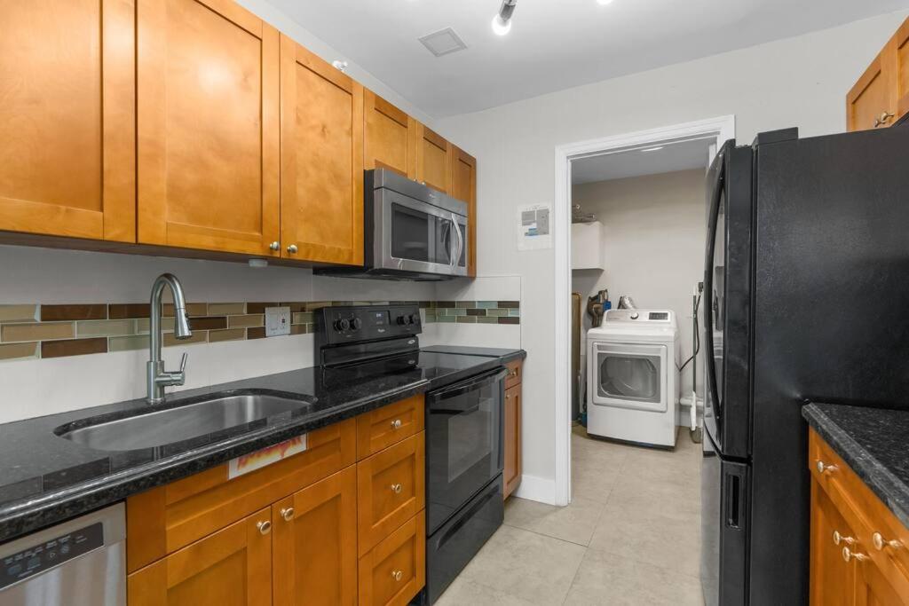 Renovated + 2MI from Beach + Heated Pool +Grill view 5