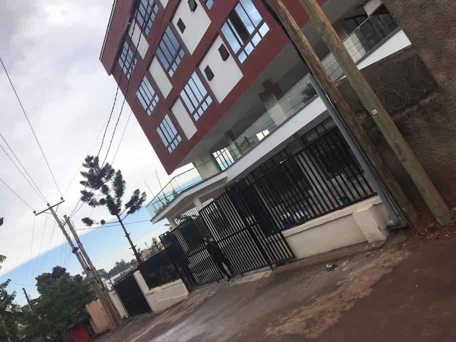 Spacious studio apartment in a modern high-security building with lift access Includes free parking in Muyenga kampala view 4