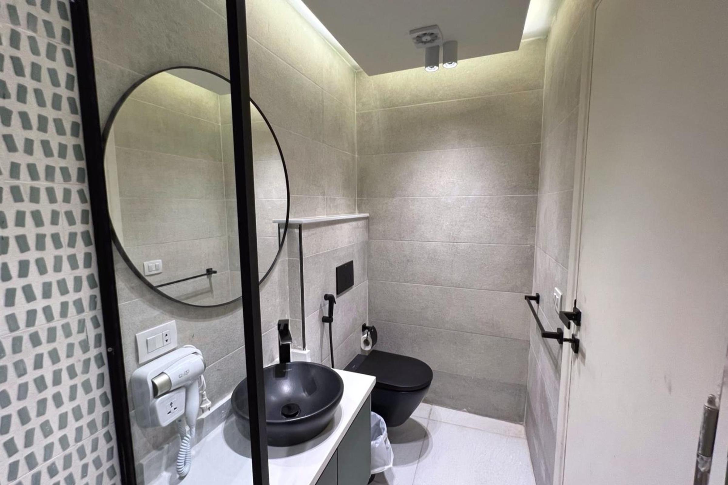 The 2 BDR Emerald Condo 5 min to CAI Airport