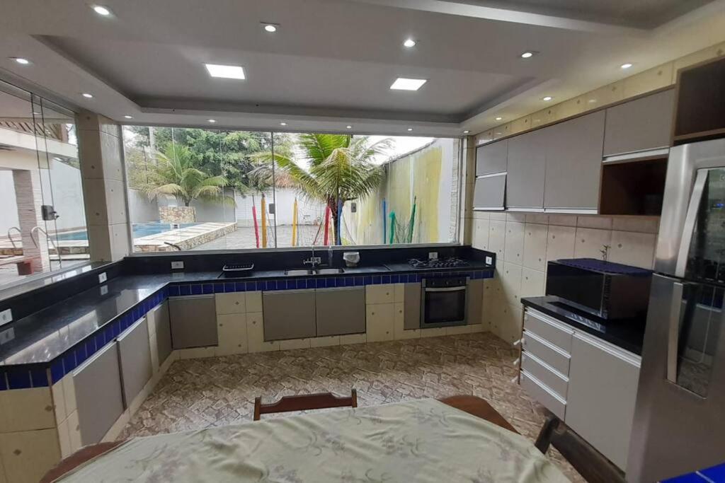 Sobrado 5 suítes na praia