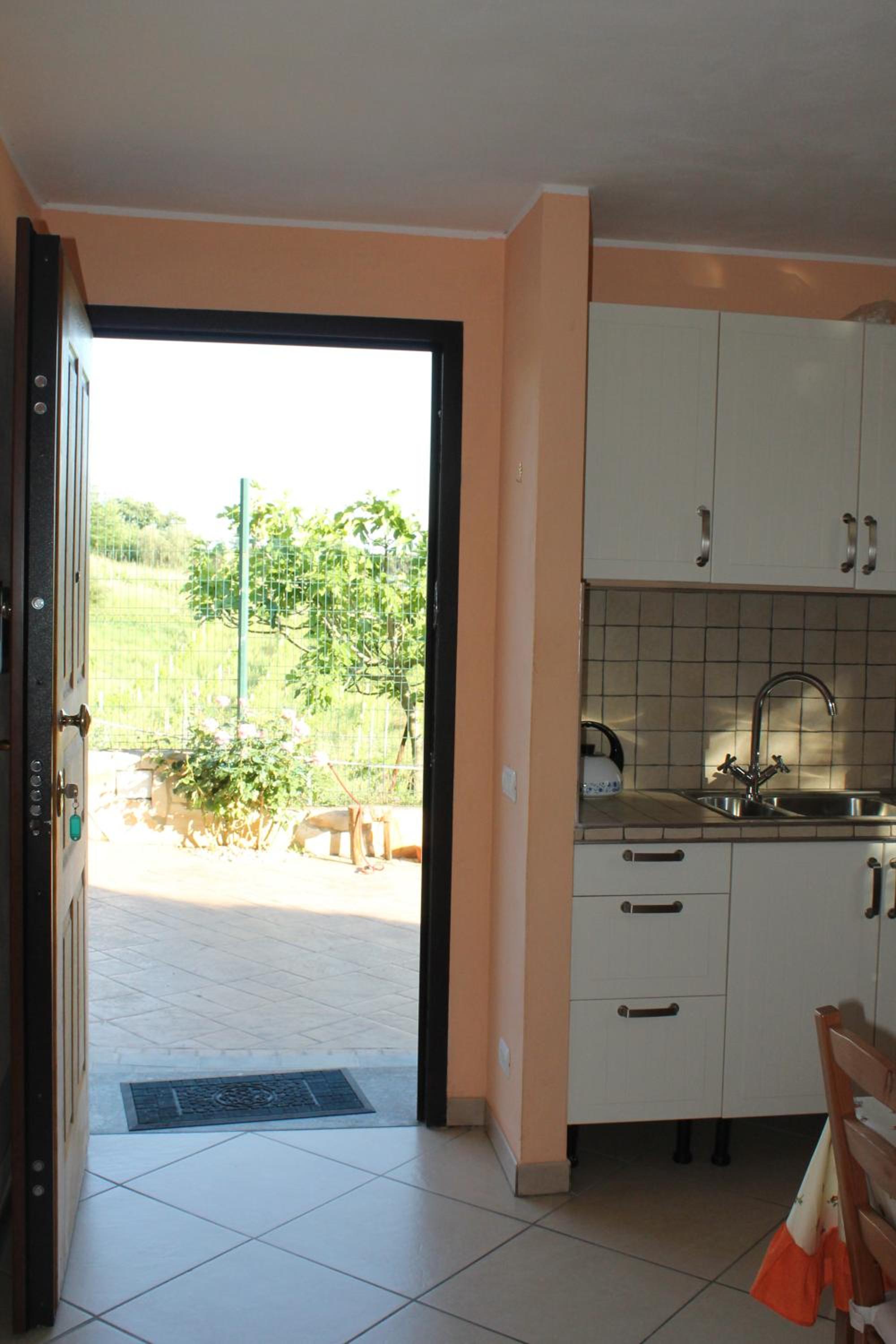 Villa Lilly en Prima Porta — kitchen