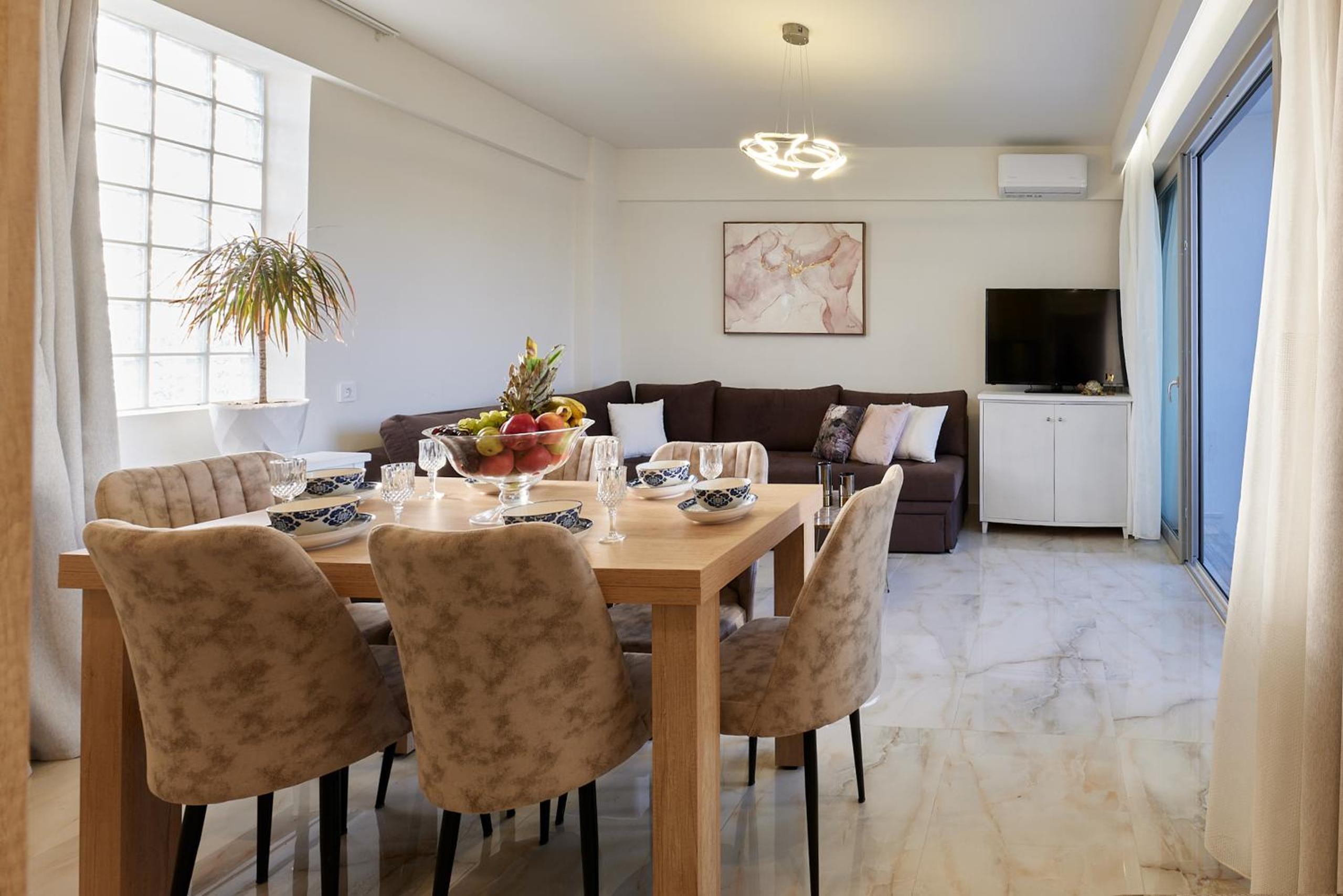 New cozy apartments in Crete Coast with pool and dining area view 5