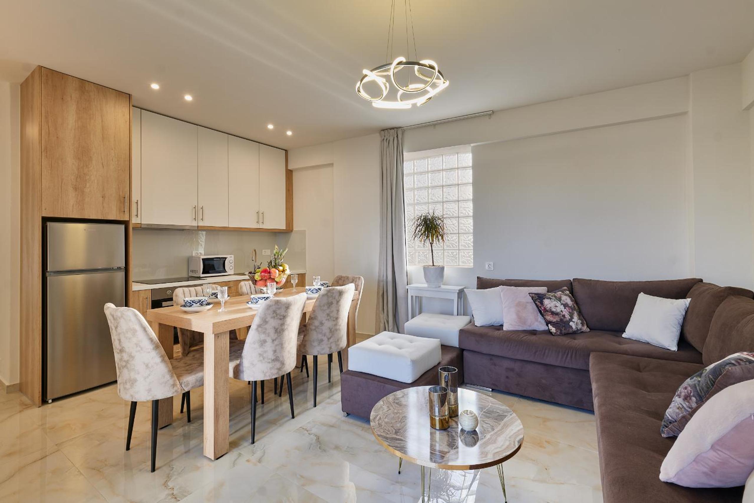 New cozy apartments in Crete Coast with pool and dining area view 4