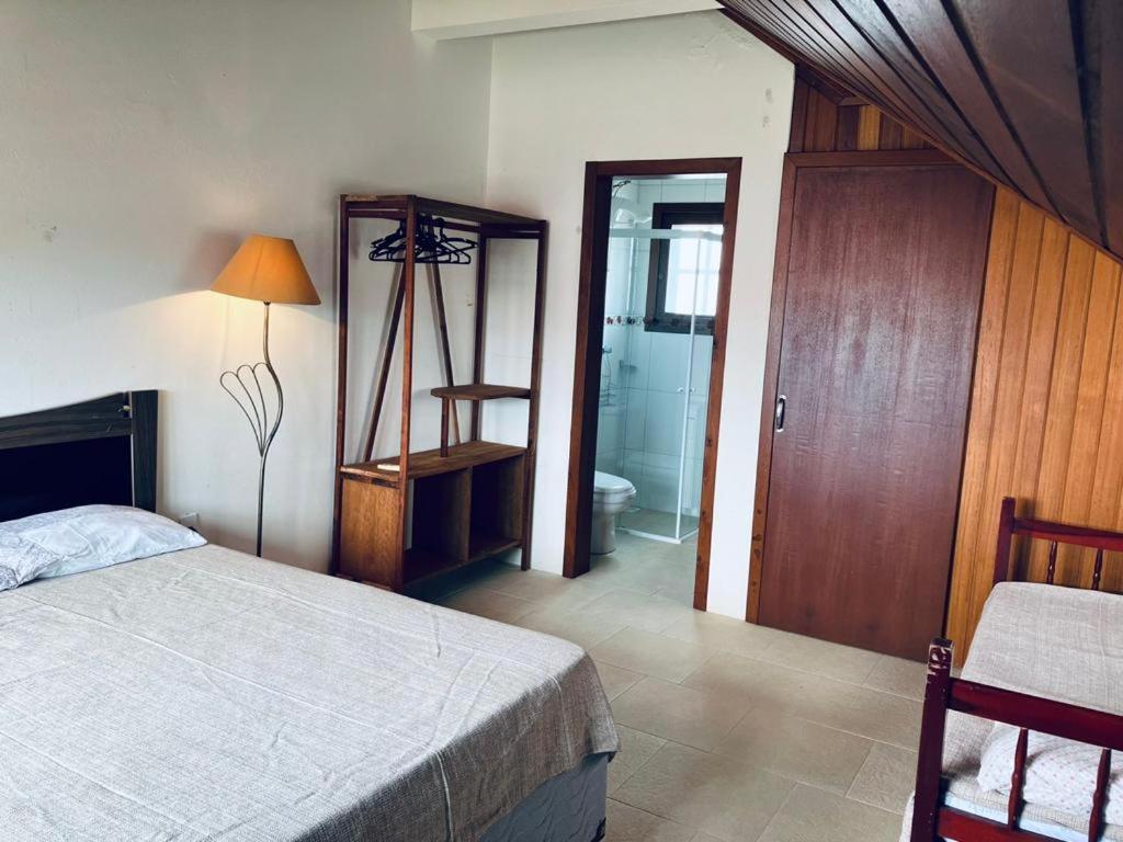 Townhouse composta por 4 triplex duas suítes a duas quadras do mar