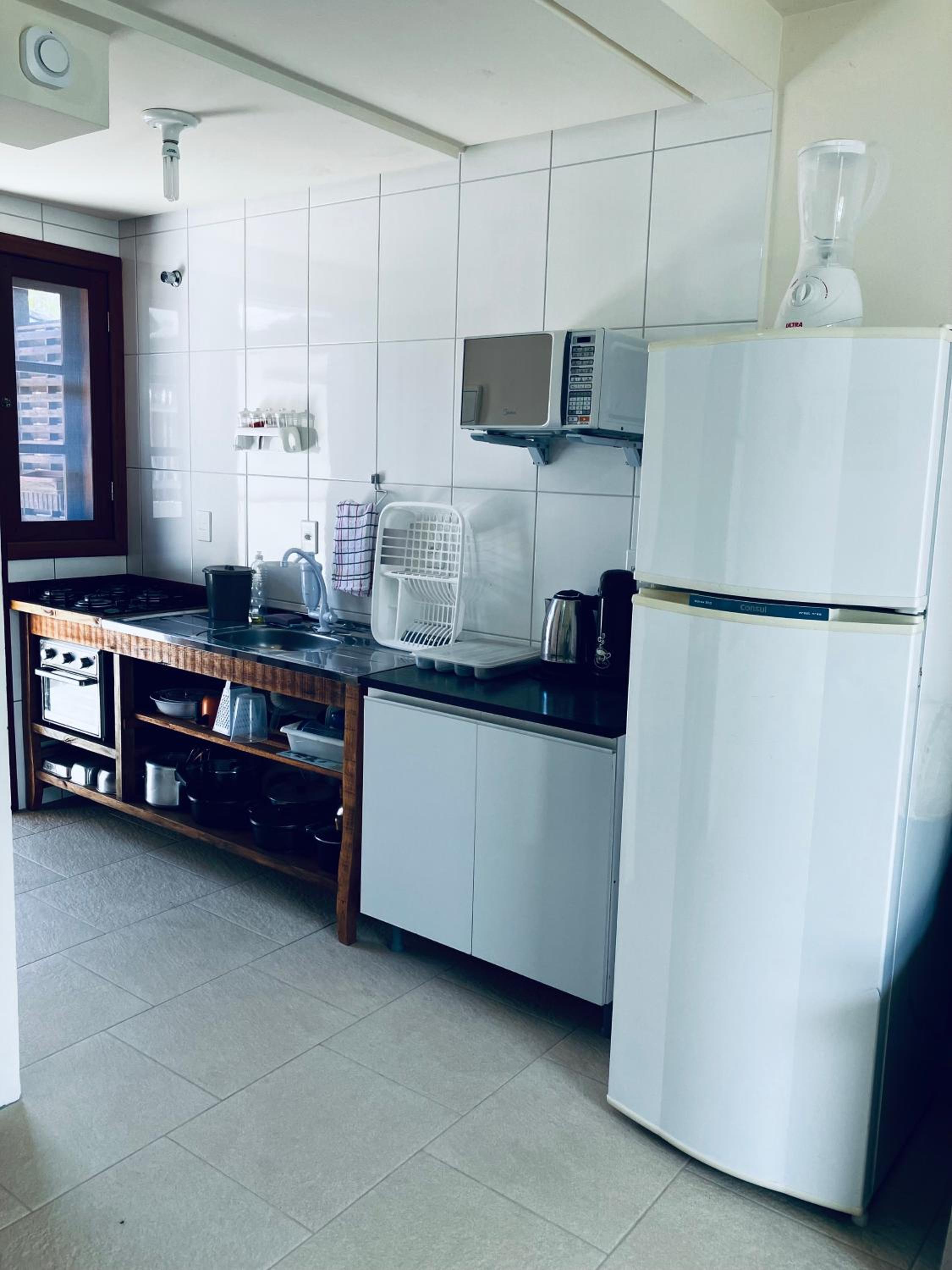 Townhouse composta por 4 triplex duas suítes a duas quadras do mar