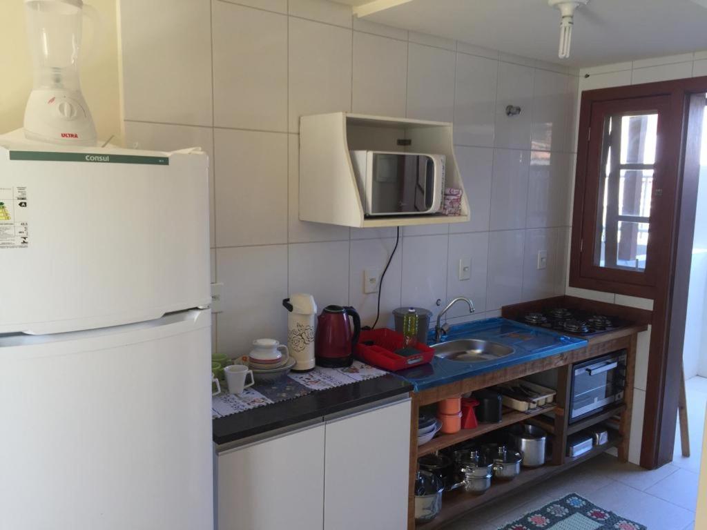 Townhouse composta por 4 triplex duas suítes a duas quadras do mar