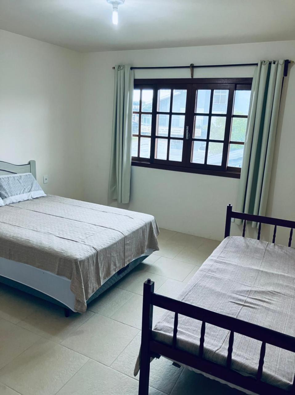 Townhouse composta por 4 triplex duas suítes a duas quadras do mar