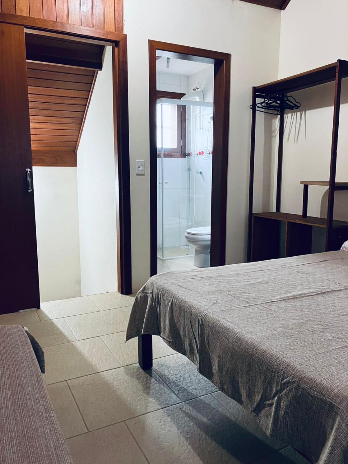Townhouse composta por 4 triplex duas suítes a duas quadras do mar