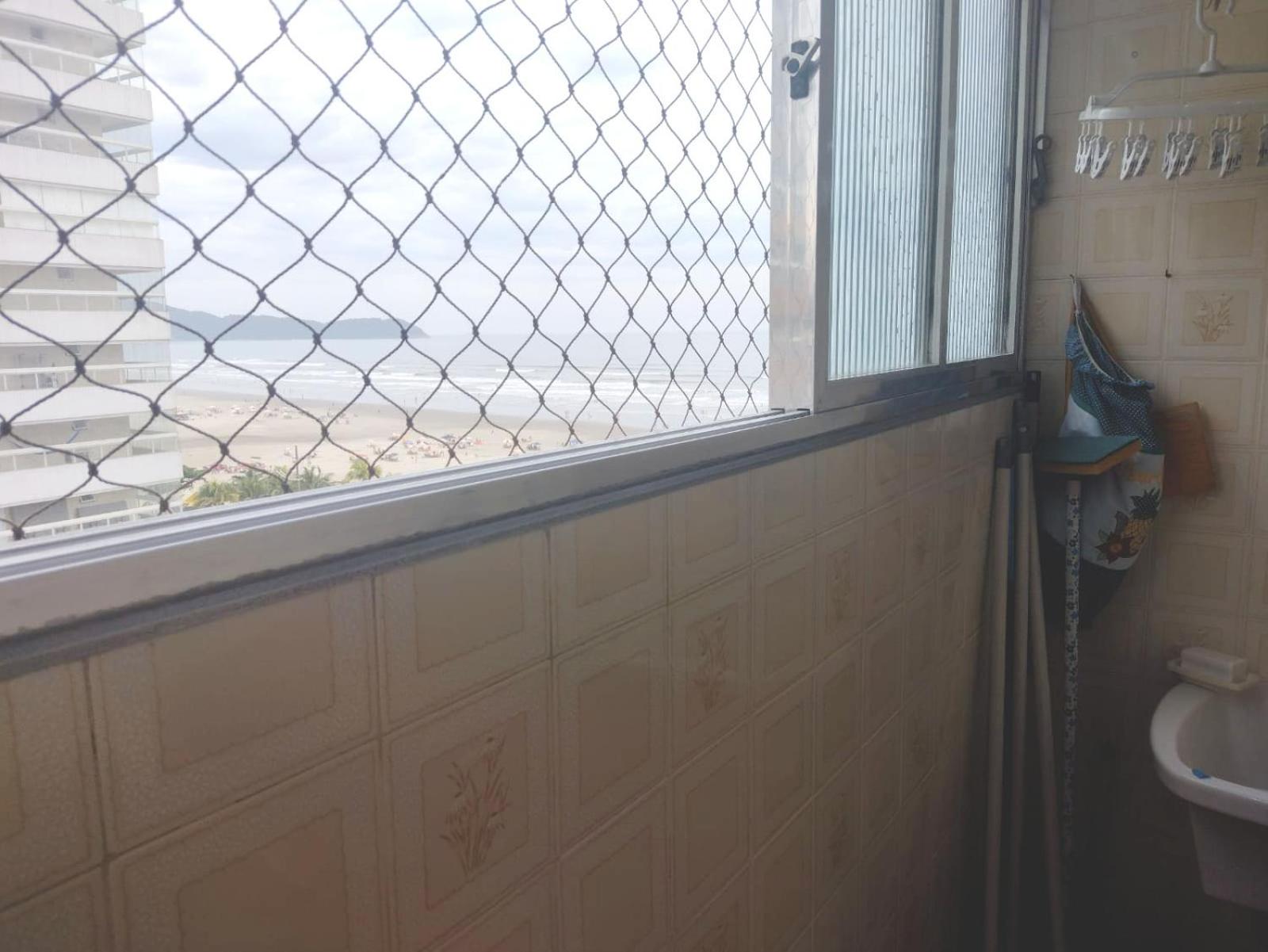 Apartamento Praia Grande Aviação em frente à praia, pé na areia