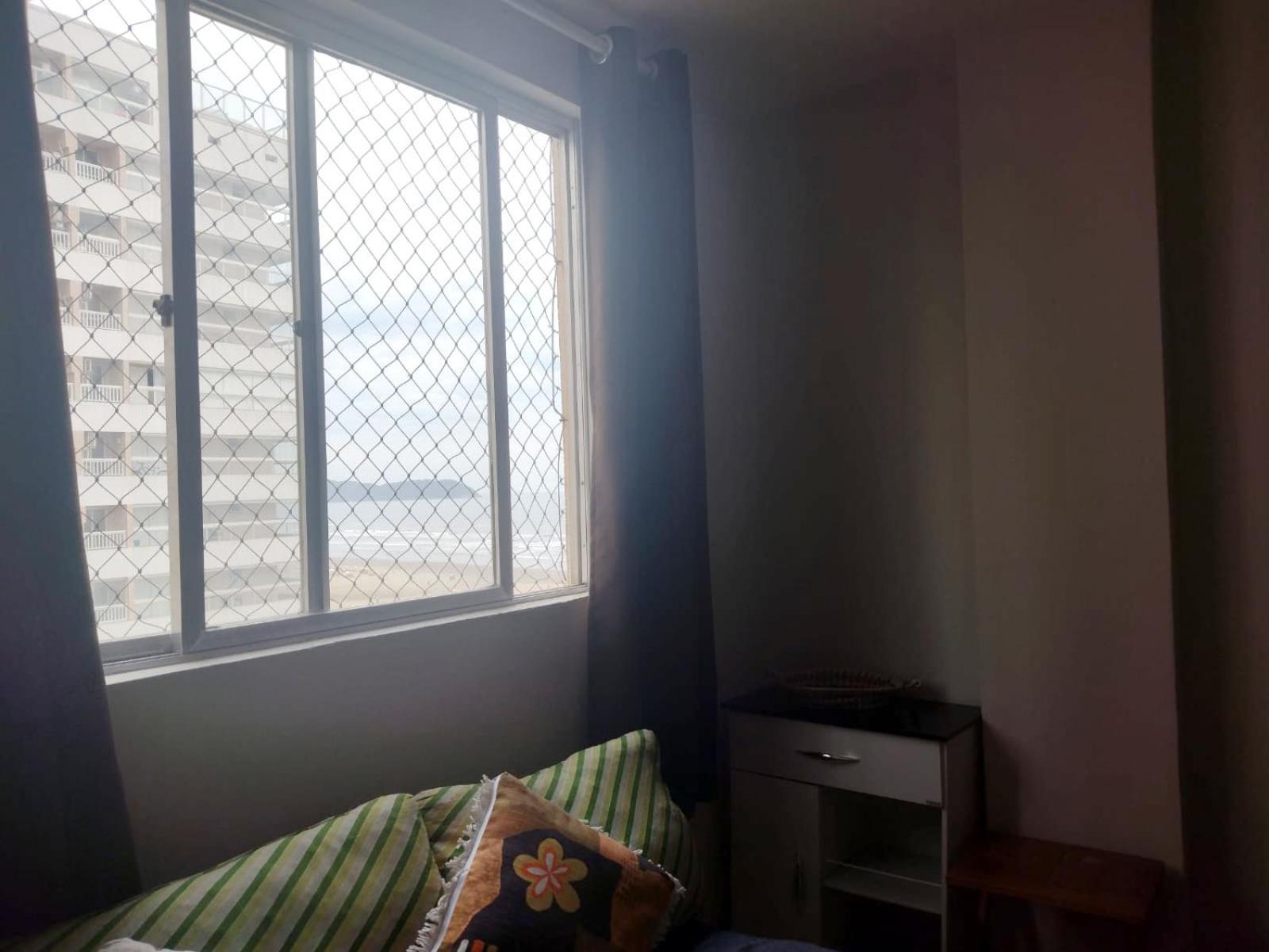 Apartamento Praia Grande Aviação em frente à praia, pé na areia