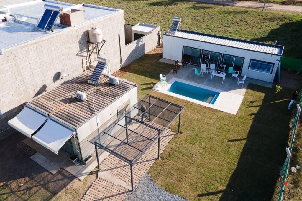 Casa quinta sustentable con asador, jardín y piscina