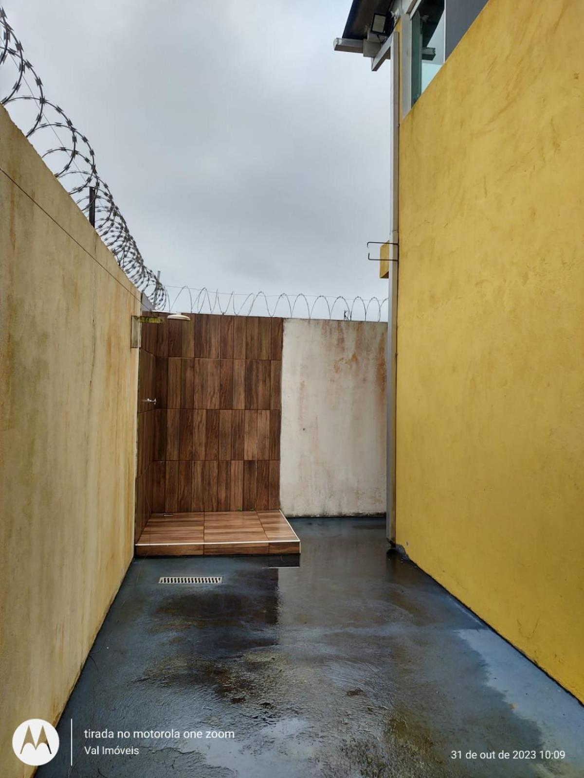 Casa amarela cantinho de lazer