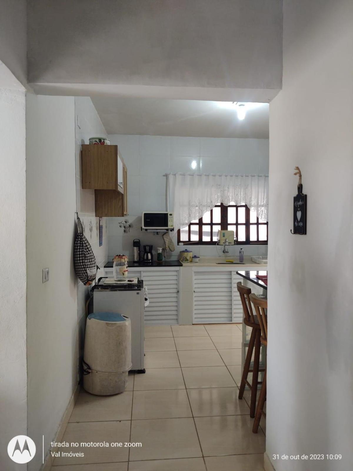 Casa amarela cantinho de lazer