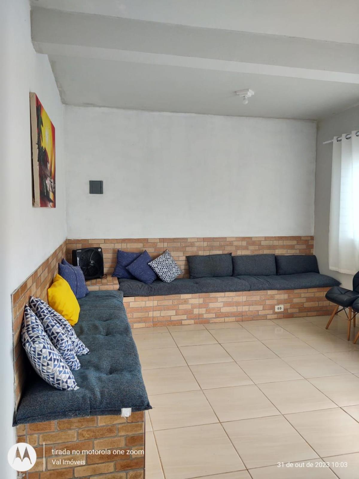 Casa amarela cantinho de lazer