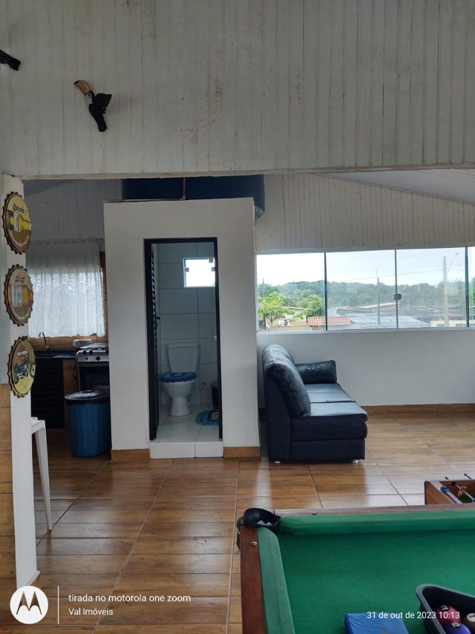 Casa amarela cantinho de lazer