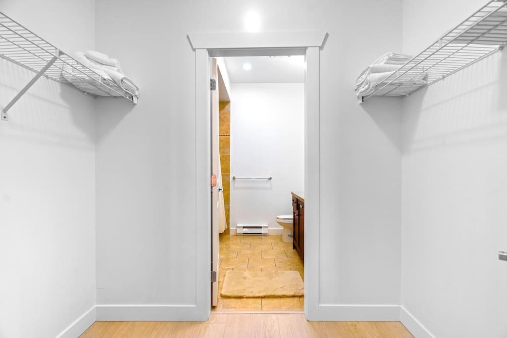 Private apartment with 2 bedrooms, 2 bathrooms, living area, laundry included