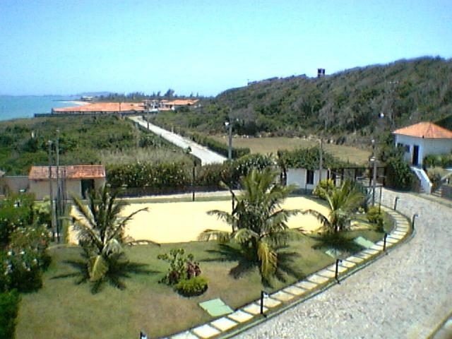 Casa frontal mar em condominio
