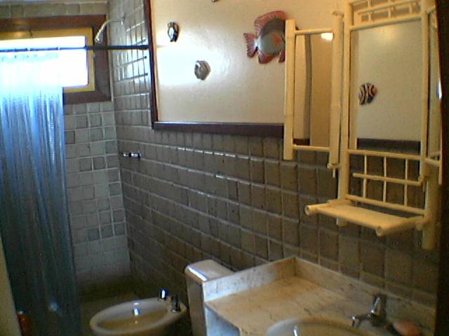 Casa frontal mar em condominio