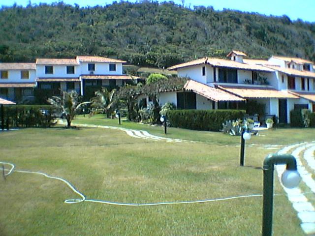 Casa frontal mar em condominio