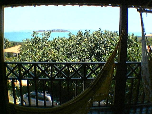 Casa frontal mar em condominio