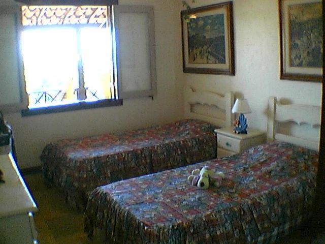 Casa frontal mar em condominio