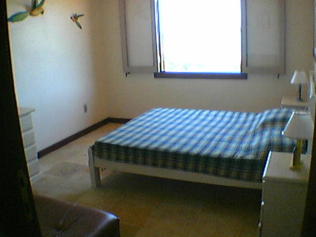 Casa frontal mar em condominio