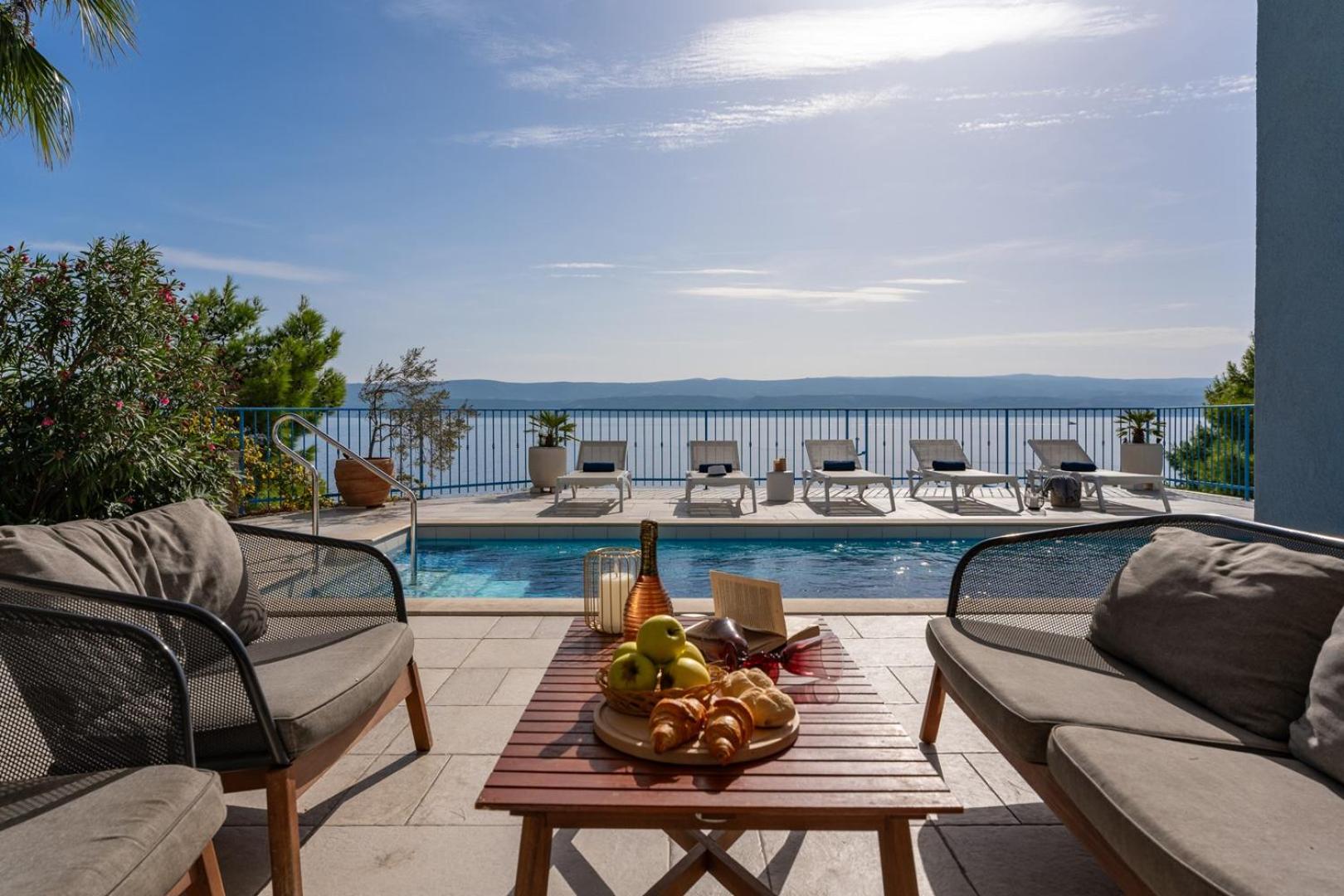 Seafront Villa Azzurro with heated pool view 2