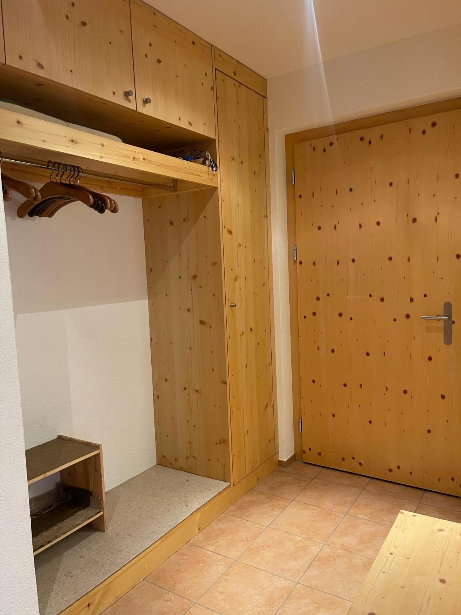 Laax Cozy Apartment Ski Bus in front of the Door