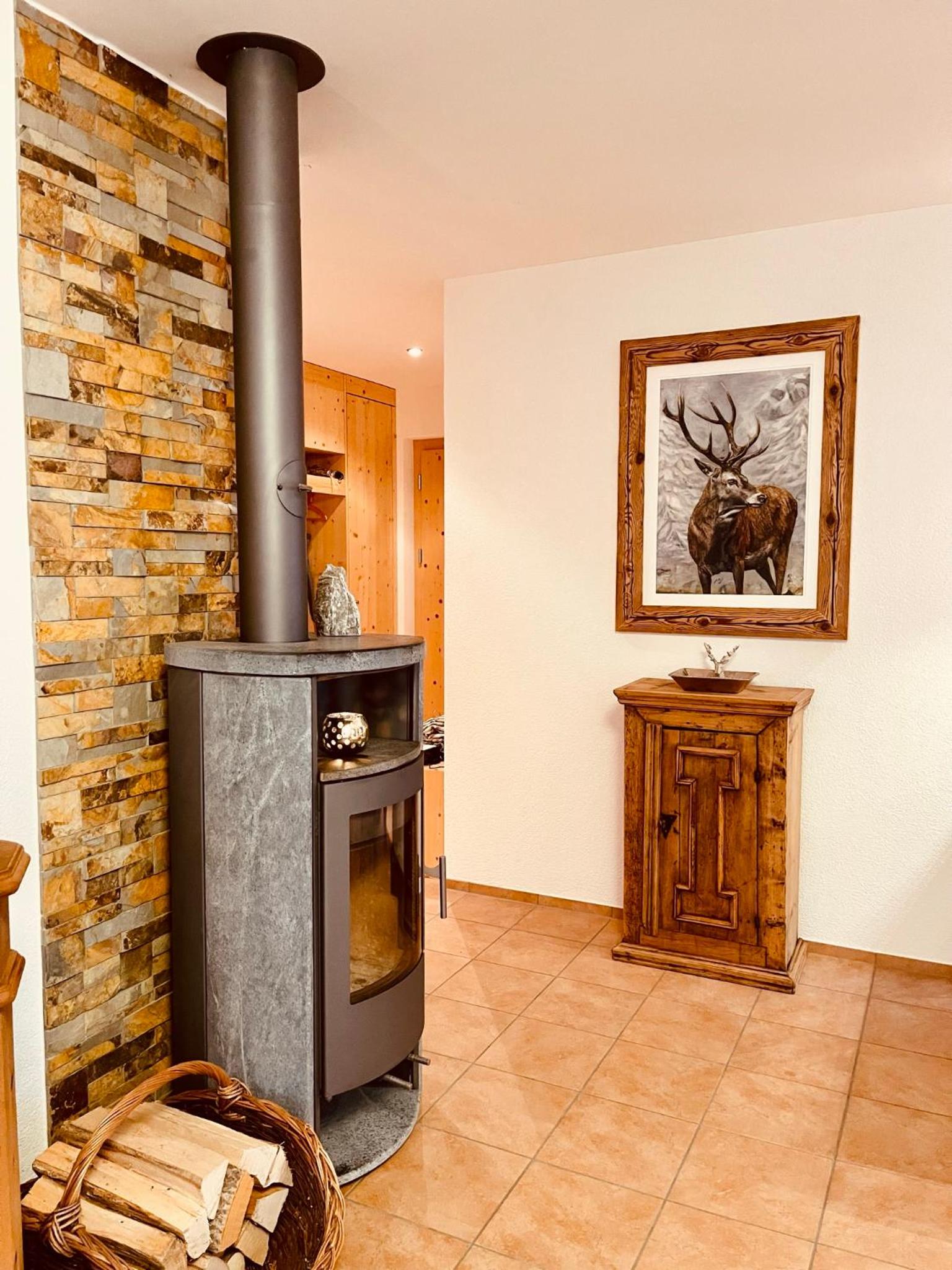 Laax Cozy Apartment Ski Bus in front of the Door