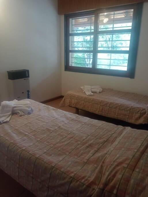 Casa 3 Habitaciones, 2 baños pileta a compartir con el anfitrion -