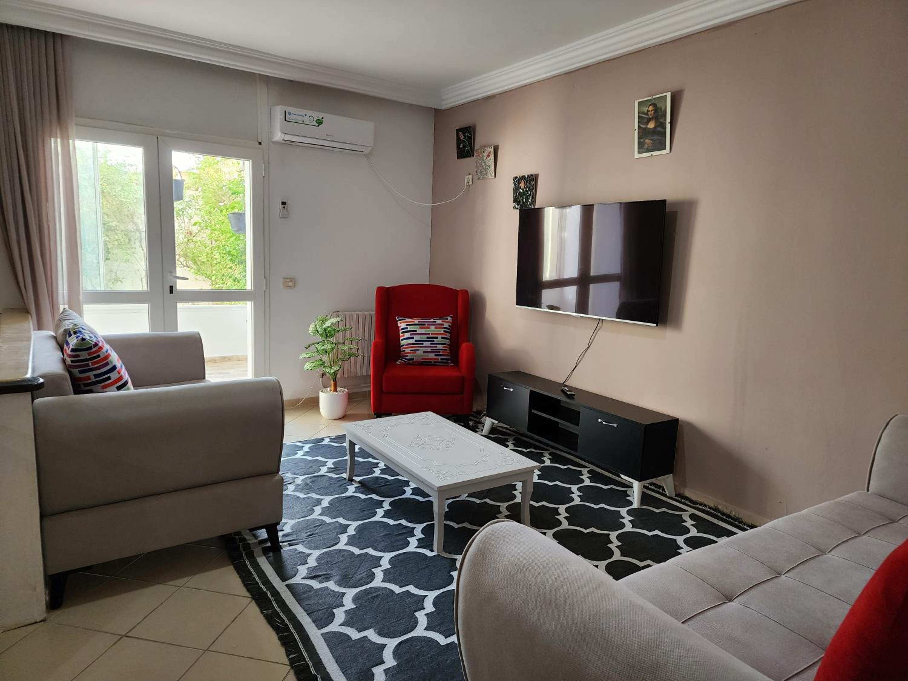 Duplex bien equipe securise avec jardin et veranda view 2