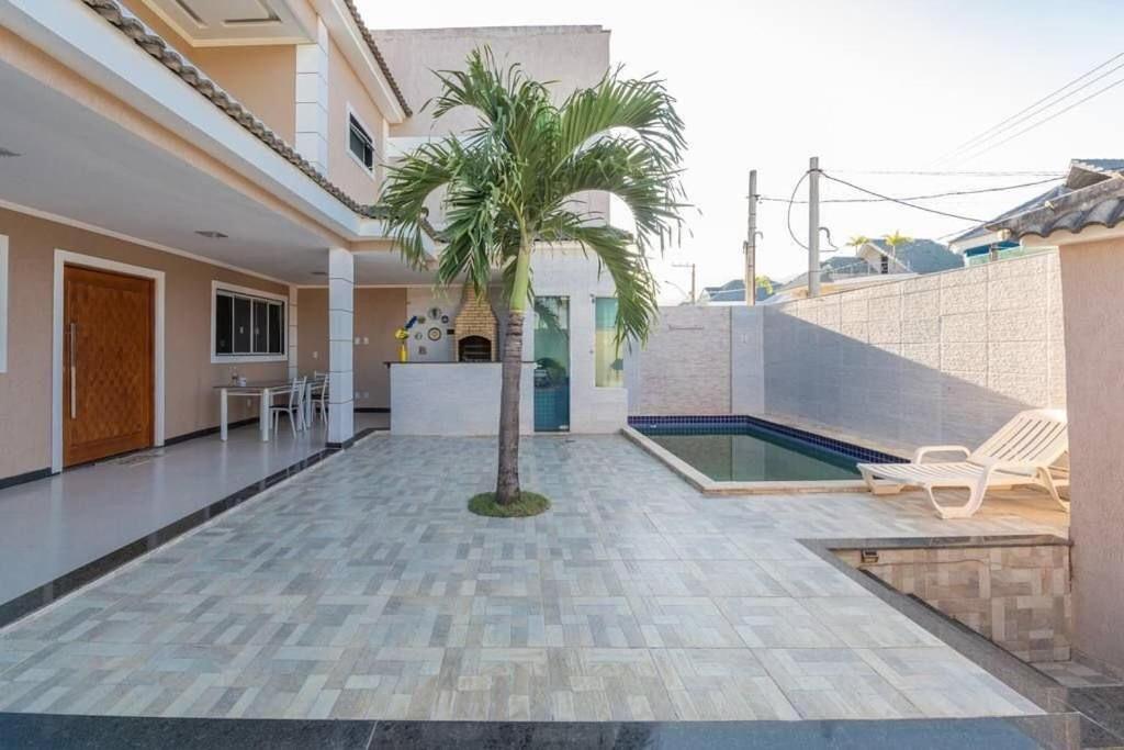 Casa em condomínio com piscina e churrasqueira