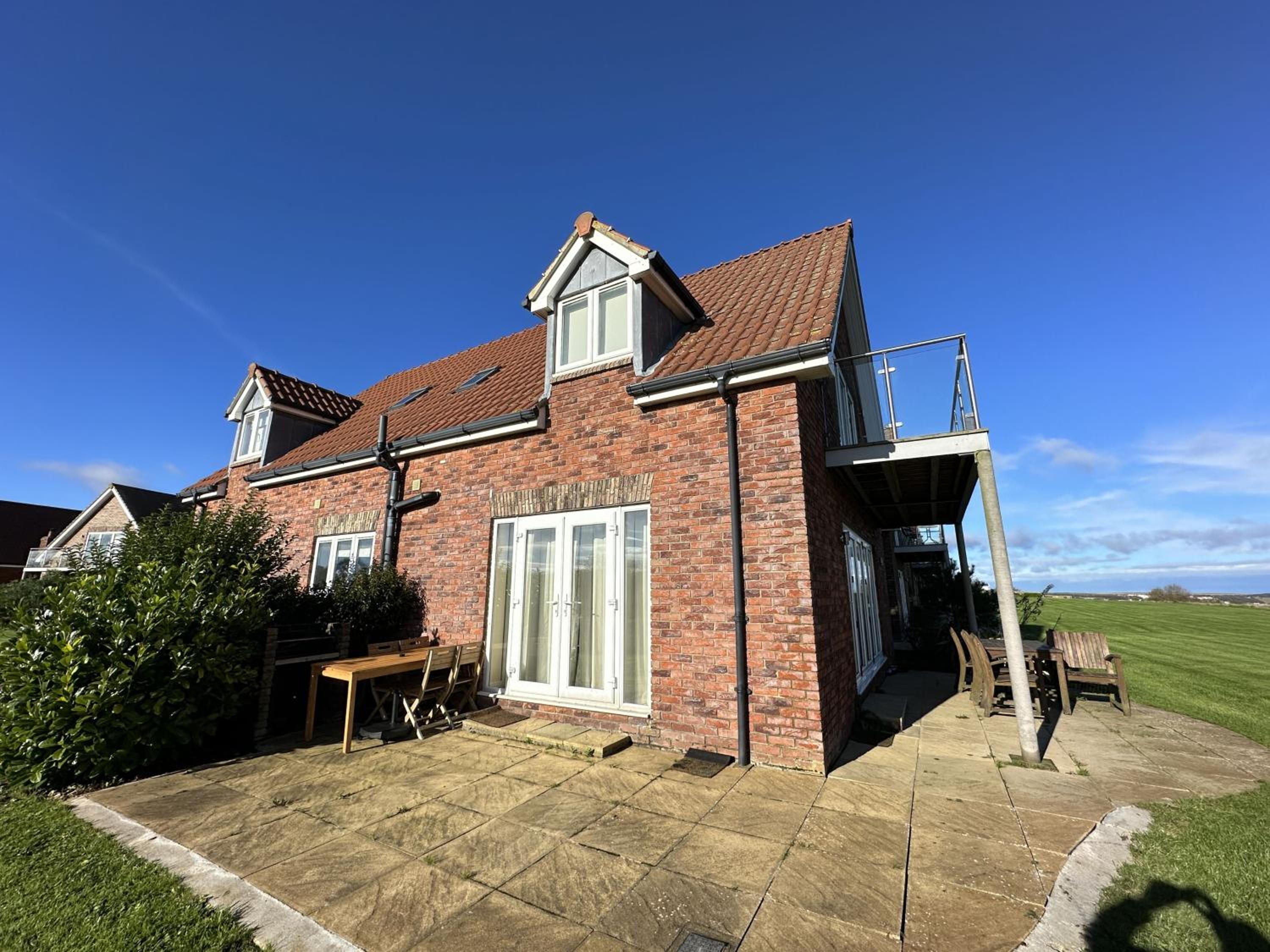 Sunrise View - Balcony and Seaview - Part of the The Bay Filey Holiday Village with pool, gym and direct beach access, pub, restaurant, tennis and meadows
