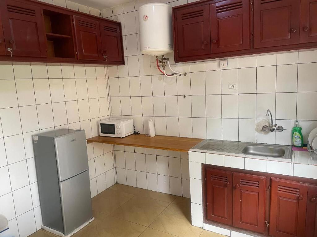 Appartements Haut Standing DM & NG à Bafoussam pour séjour professionnel - parking & gardien