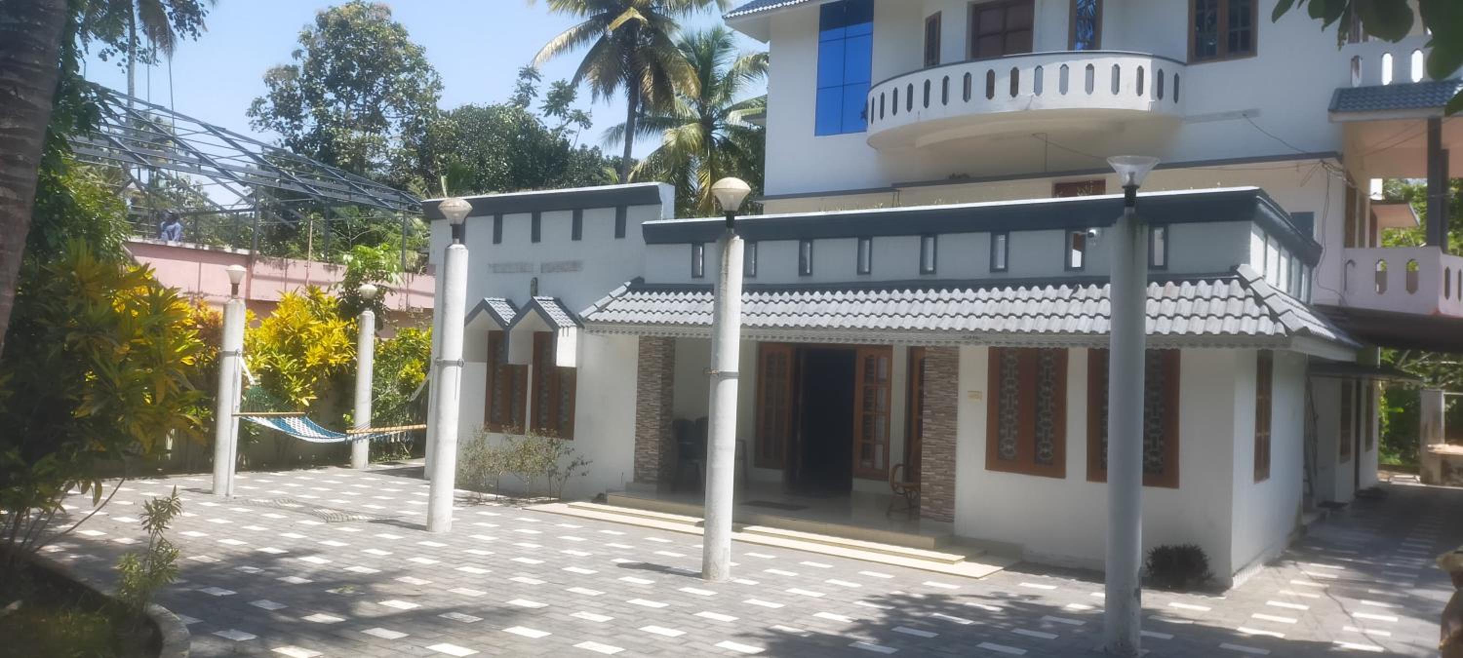 Varkala AC 3Bhk hammocks courtyard patio view 2