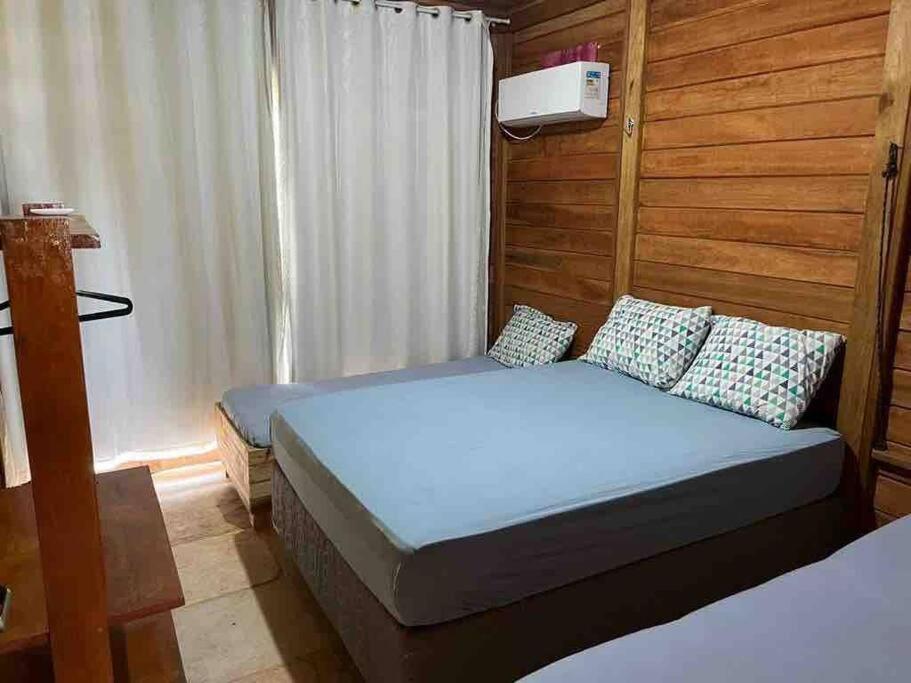 Casa amarela flecheiras