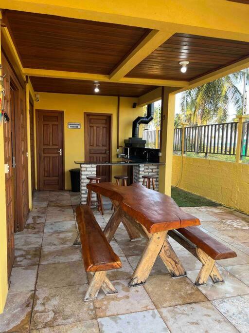 Casa amarela flecheiras