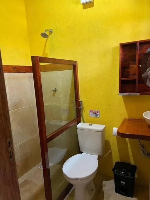 Casa amarela flecheiras