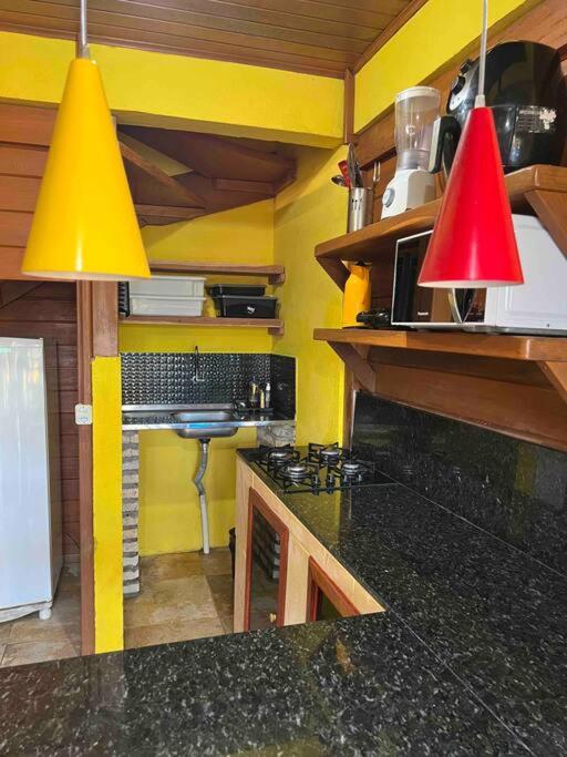 Casa amarela flecheiras