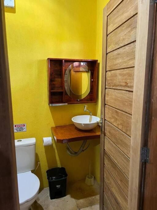 Casa amarela flecheiras