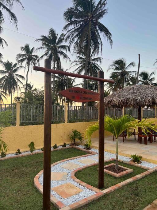 Casa amarela flecheiras