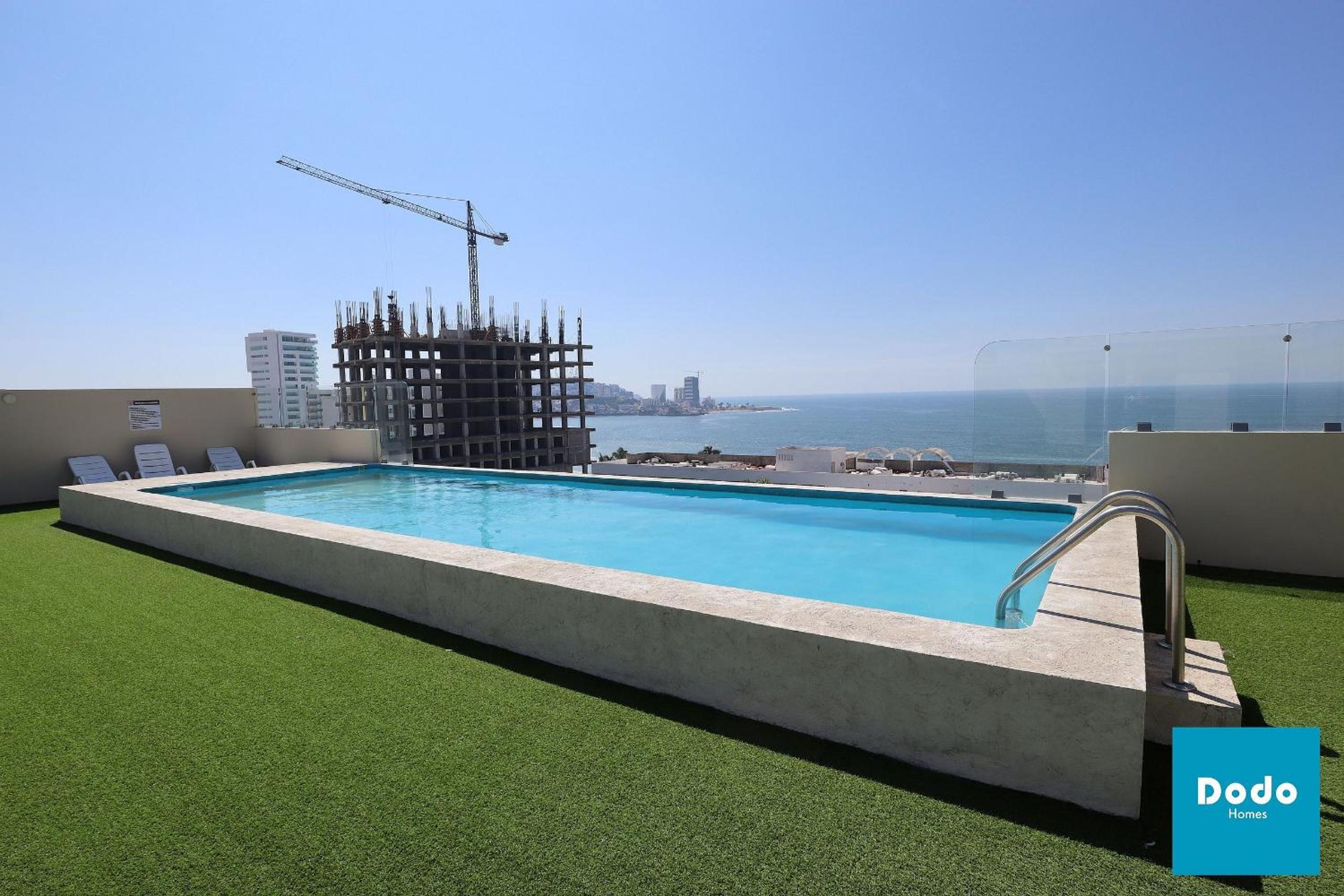 Torre con roof garden y piscina con vista al mar view 5