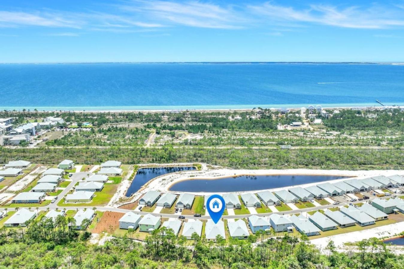Home in Windmark Beach with golf cart, community pool and beach view 4
