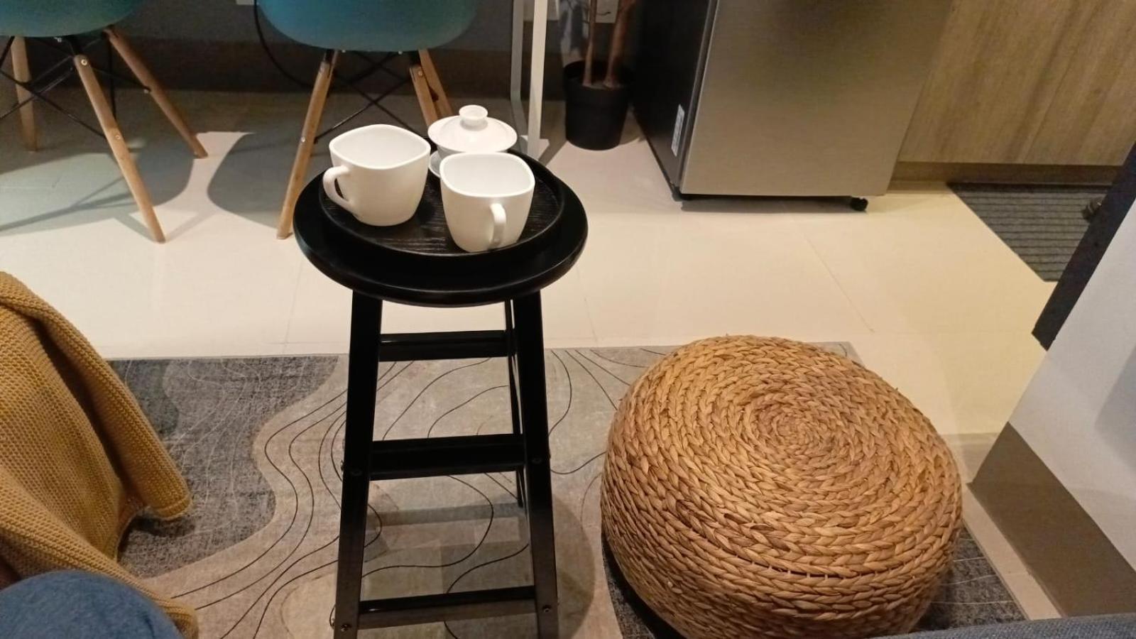 Cozy New 1BR Fame Residences Condo with Balcony view 4