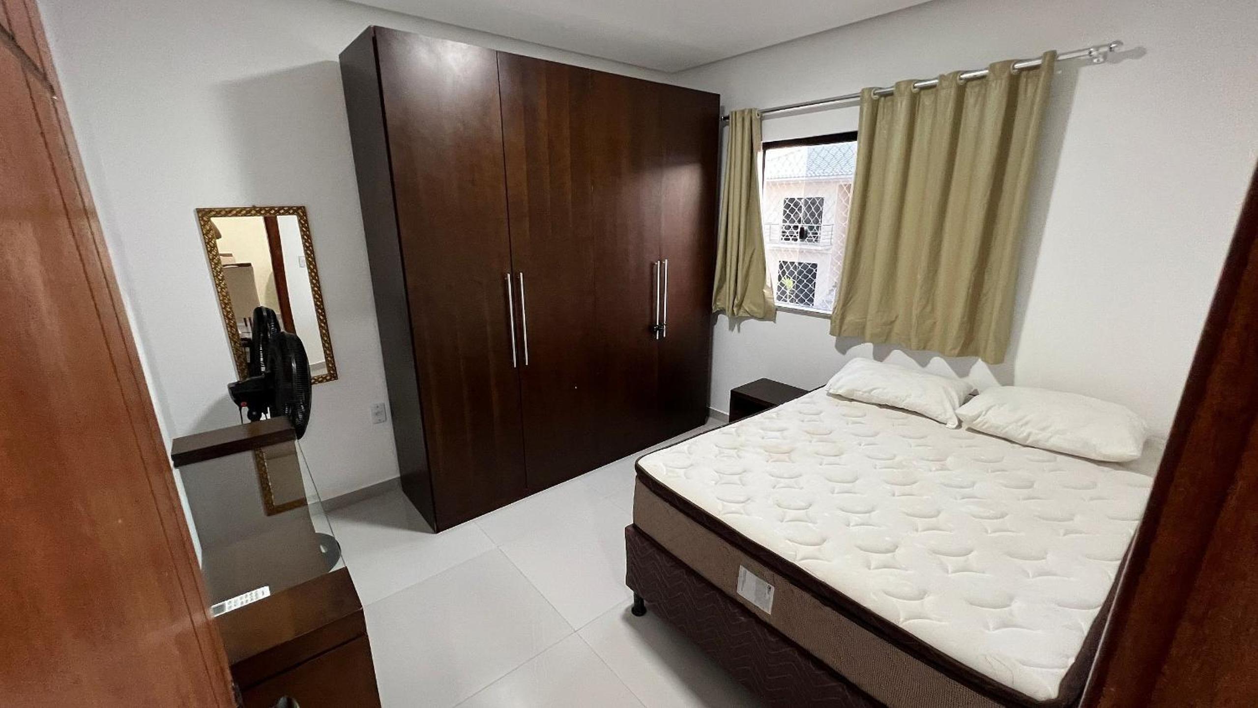 Quarto duplo na orla de Porto Bahia